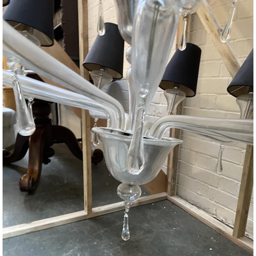 755 - A two tier plastic chandelier of recent manufacture, the tiers with six and nine fittings, each with... 