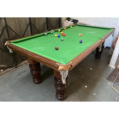 773 - A half size slate billiards table, on substantial turned legs