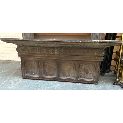 661 - Two oak panelled and carved fire places, each with central lion mask detail, each 153cmW