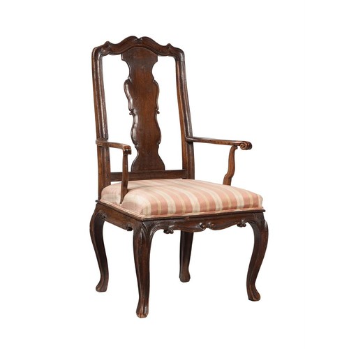 784 - A French provincial walnut armchair, mid 18th century