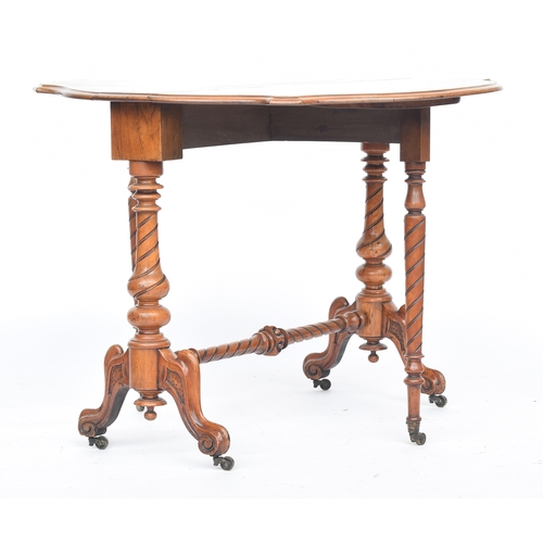 550 - A Victorian burr walnut gateleg table, the shaped quarter veneer top on a spirally turned base, with... 