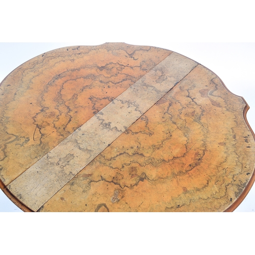 550 - A Victorian burr walnut gateleg table, the shaped quarter veneer top on a spirally turned base, with... 