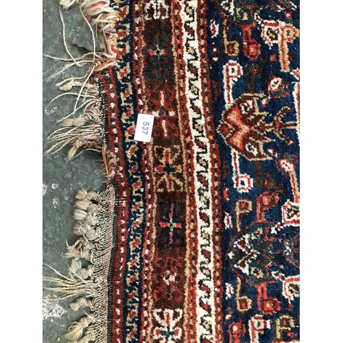 537 - A West Persian rug with central serrated lozenge, 210x148cm