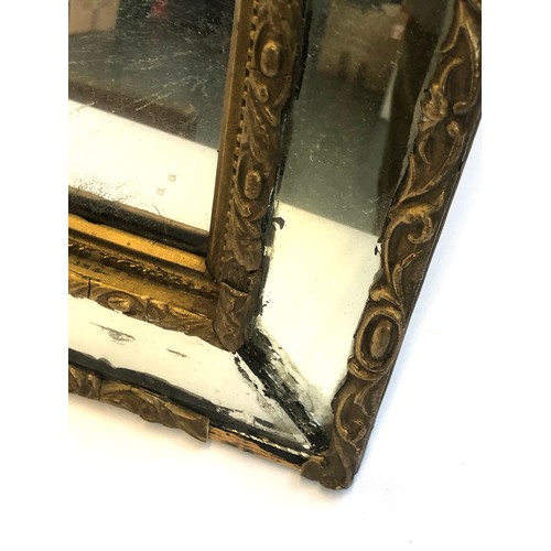 391 - A gilt gesso mirror, with mirrored inset frame, 45cm wide, 55cm high