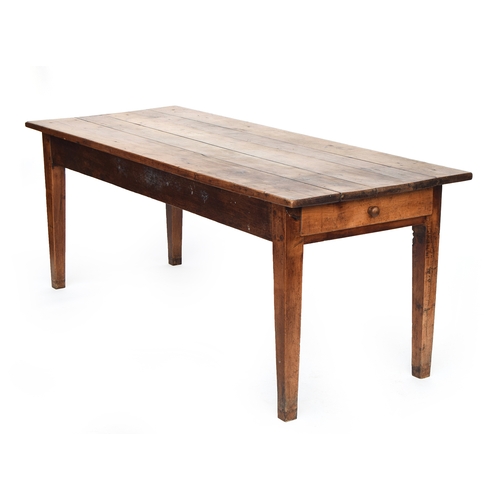 589 - A 19th century French fruitwood kitchen table, five plank top, with single end drawer, on square tap... 