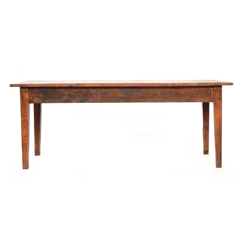 589 - A 19th century French fruitwood kitchen table, five plank top, with single end drawer, on square tap... 