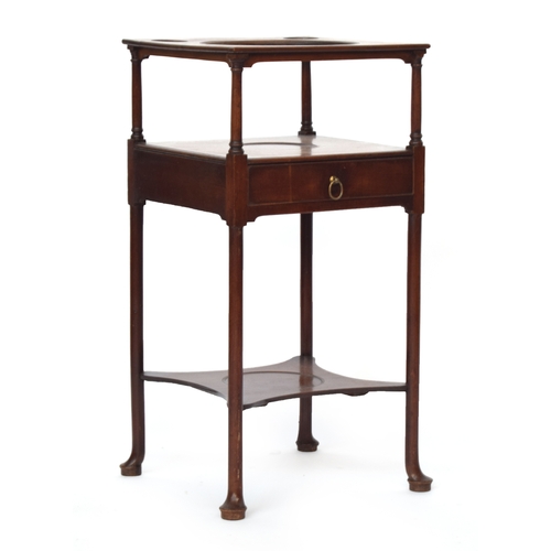 645 - A George II mahogany washstand, the top with cutout for washbowl, drawer below and undershelf, on pa... 