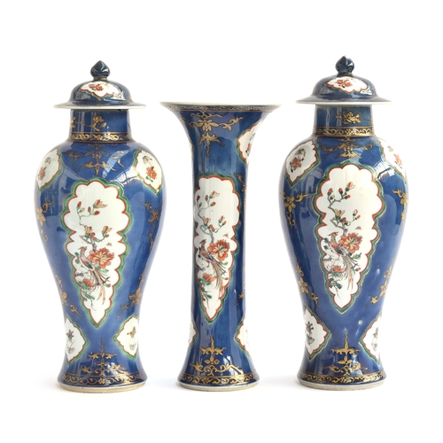 125 - A pair of 19th century Chinese baluster vases and covers (af), each painted with shaped panels enclo... 