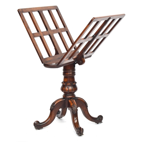 648 - A Victorian walnut portfolio stand, the two slatted hinged leaves on a brass ratchet mechanism (cord... 