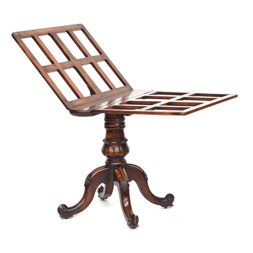 648 - A Victorian walnut portfolio stand, the two slatted hinged leaves on a brass ratchet mechanism (cord... 