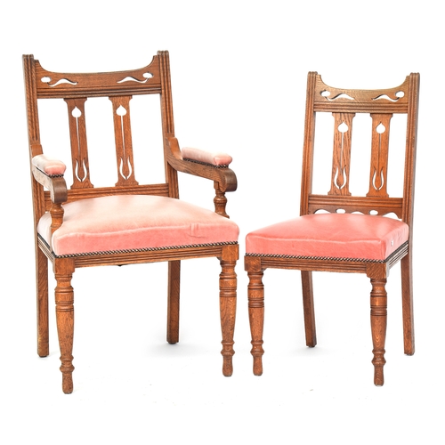 594 - A good set of 14 early 20th century Arts & Crafts oak dining chairs, Liberty style, two carvers, eac... 