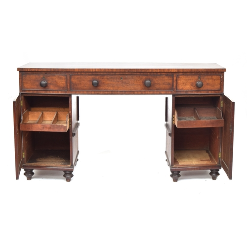 509 - A 19th century mahogany bowfront sideboard, the top with three drawers, each pedestal with cupboard ... 