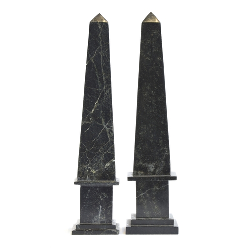 419 - A near pair of serpentine marble obelisks, on stepped plinths, each 46cm high

Provenance: from the ... 