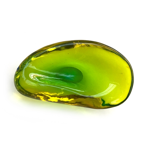 74 - A green art glass dish in the form of a mussel shell, 16cmW; together with a green glass vase of com... 