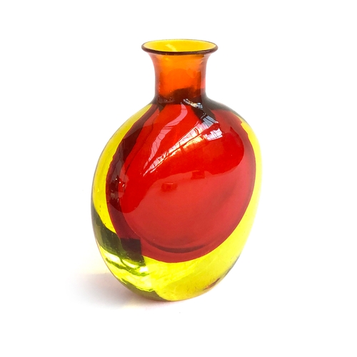 75 - An extremely heavy amber coloured art glass vase, of compressed form, 26.5cm high