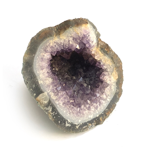 177 - A small amethyst geode, approx. 12cmH