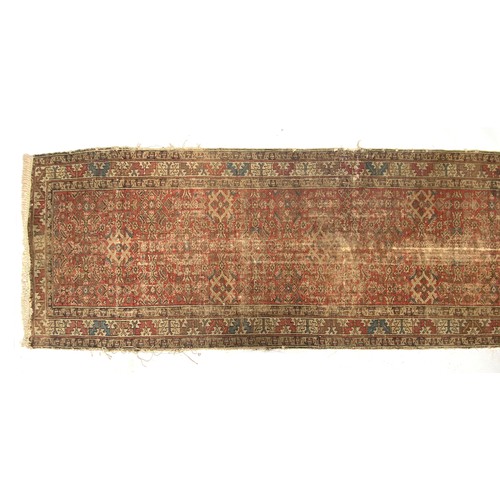 663 - A West Persian runner rug, 107x405cm