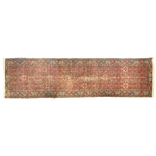 663 - A West Persian runner rug, 107x405cm