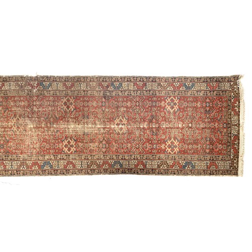 663 - A West Persian runner rug, 107x405cm