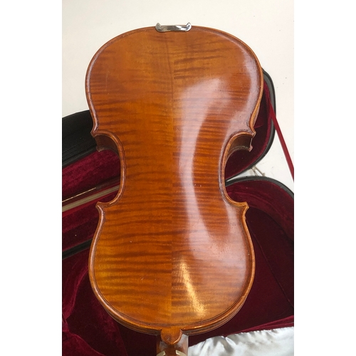 218 - A good 1/4 size student violin, with red velour lined carry case