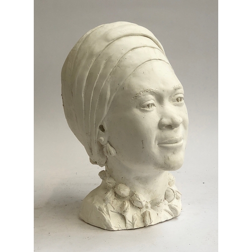 228 - A large plaster bust of a lady in headscarf, 44cmH