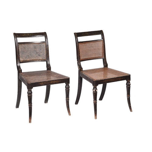 614 - A pair of Regency ebonised and decorated side chairs, c.1815, in the manner of John Gee