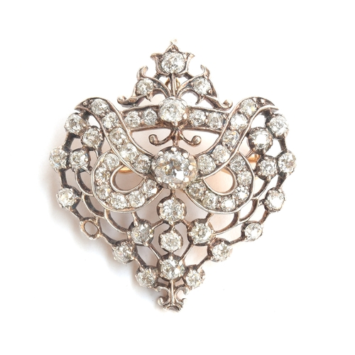 19 - A Belle Epoque gold, silver and diamond set openwork pendant brooch, set with 51 old cut diamonds (o... 