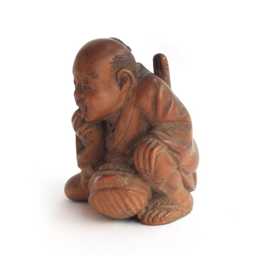 171 - A Japanese boxwood netsuke of a kneeling man, 3.5cm high

Provenance: the Peto Family, formerly of C... 