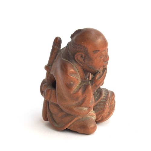 171 - A Japanese boxwood netsuke of a kneeling man, 3.5cm high

Provenance: the Peto Family, formerly of C... 