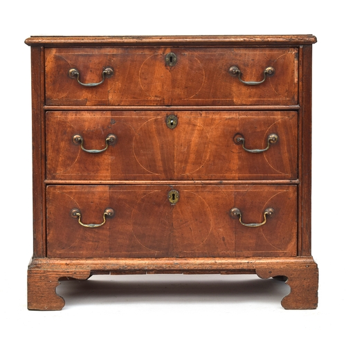 472 - An early 18th century walnut chest of three drawers, inlaid, 86cm wide, 54cm deep, 82cm high