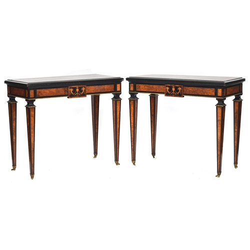 536 - A pair of burr walnut, ebonised, and marquetry Victorian swivel top card tables, each frieze with ce... 