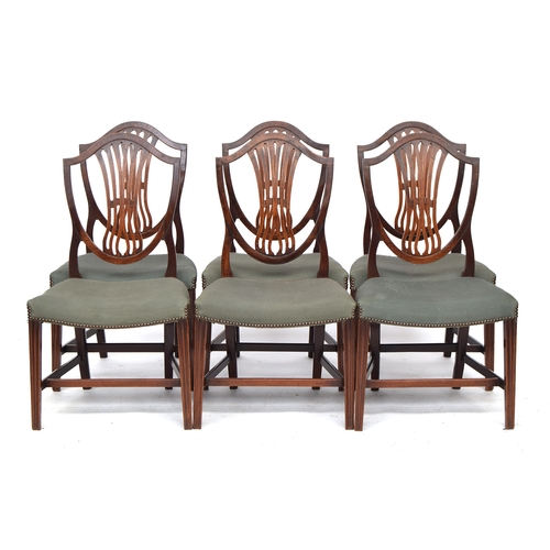 596 - A set of six George III style mahogany shield back dining chairs, 19th century, curved stuffover sea... 