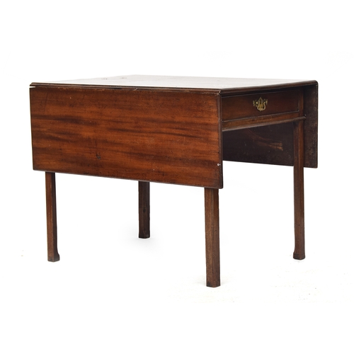 560 - A George III mahogany Pembroke table, of generous proportions, single end drawer, on chamfered squar... 