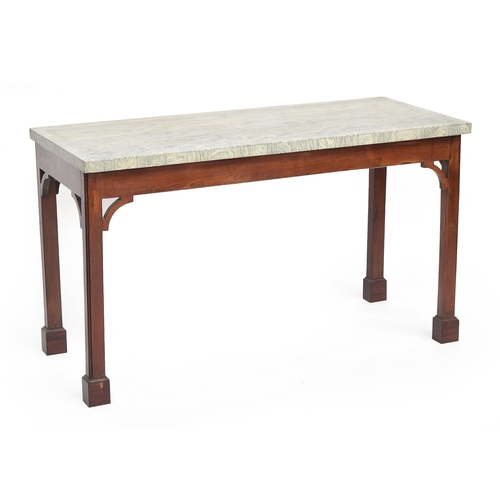 586 - A George III marble topped serving table, the moulded square section legs on later block feet, 145cm... 