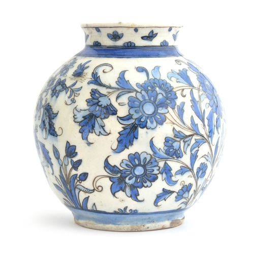 154 - An Iznik style ovoid vase, blue floral decoration, marked to base '3028', 18cm high

Provenance: the... 