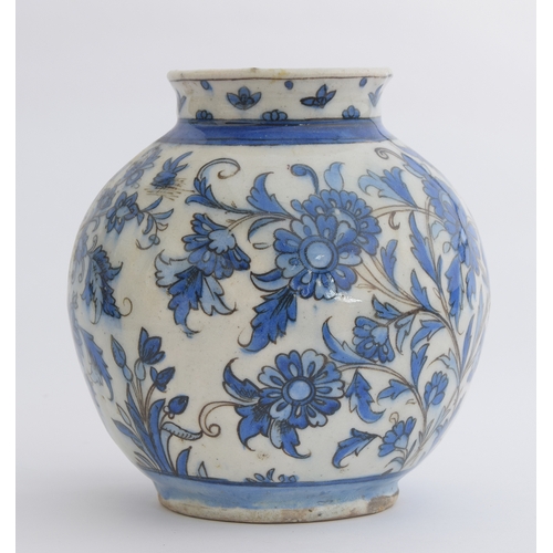 154 - An Iznik style ovoid vase, blue floral decoration, marked to base '3028', 18cm high

Provenance: the... 