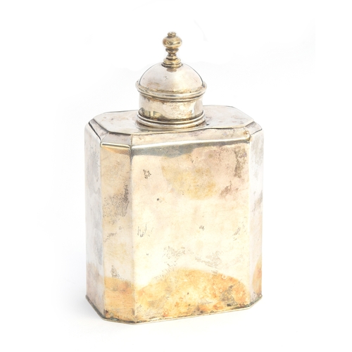 75 - A white metal tea canister, domed cover with finial, the canister of canted oblong form, 13cm high, ... 