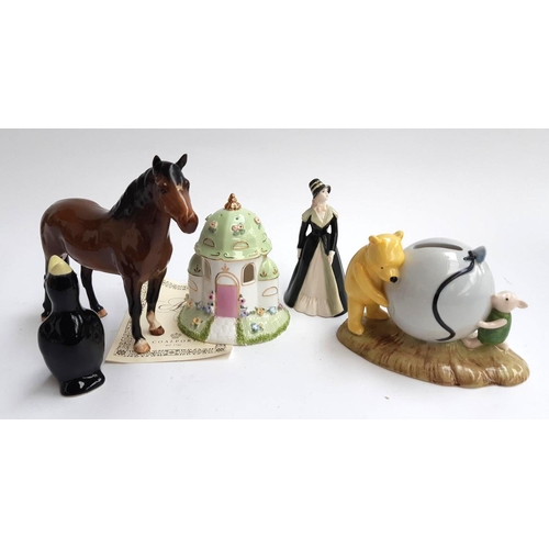 121 - A Beswick figure of a horse, 17.5cmH together with a Coalport 'Anniversary cottage', a Coalport figu... 