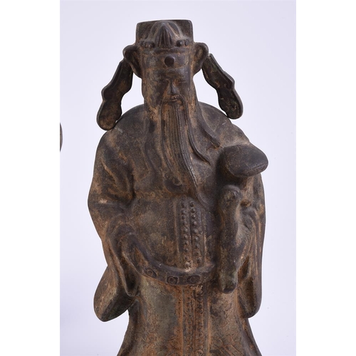 168 - Three 20th century Chinese cast iron models of deities, the tallest 32cm high 

Provenance: The prop... 