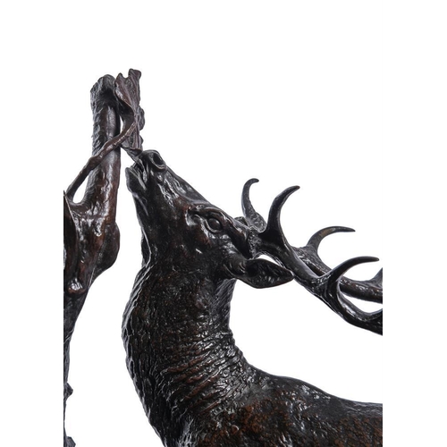 108 - After Pierre-Jules Mene (1810-1879), a late 19th/early 20th century bronze model 'The Browsing Stag'... 