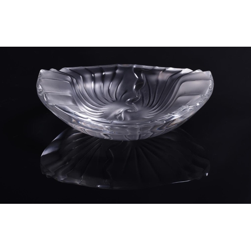 219 - A group of four small crystal Lalique bowls comprising a small 'Honfleur' bowl, 15cm diameter, a 'Du... 