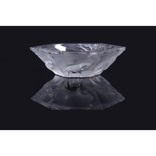 219 - A group of four small crystal Lalique bowls comprising a small 'Honfleur' bowl, 15cm diameter, a 'Du... 