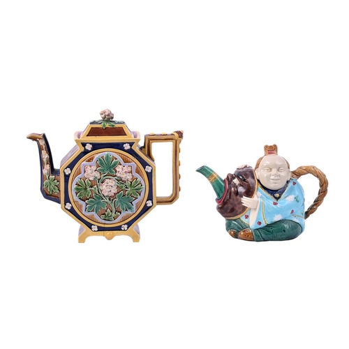 197 - A Minton majolica teapot and cover modelled as a Chinese figure, date code for 1874, faintly impress... 