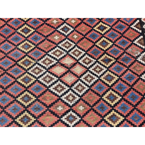 675 - A large Kilim rug, approximately 360x170cm