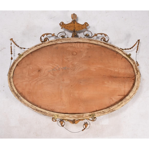 392 - A late 19th/early 20th century giltwood oval wall mirror in Adam style, 125cm wide, 123cm high