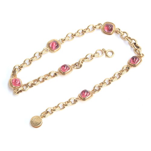 37 - A Cassandra Goad 9ct gold necklace, the chain interspersed with six gold mounted pink tourmaline sug... 