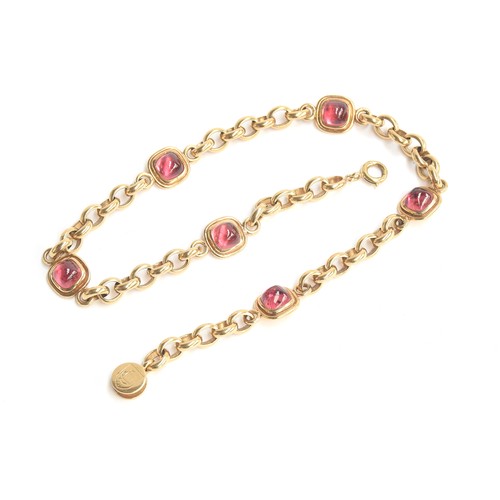 37 - A Cassandra Goad 9ct gold necklace, the chain interspersed with six gold mounted pink tourmaline sug... 