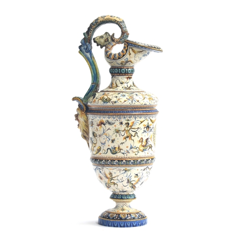 198 - A large 19th century Cantagalli majolica ewer, the handle restored, painted with mythological figure... 