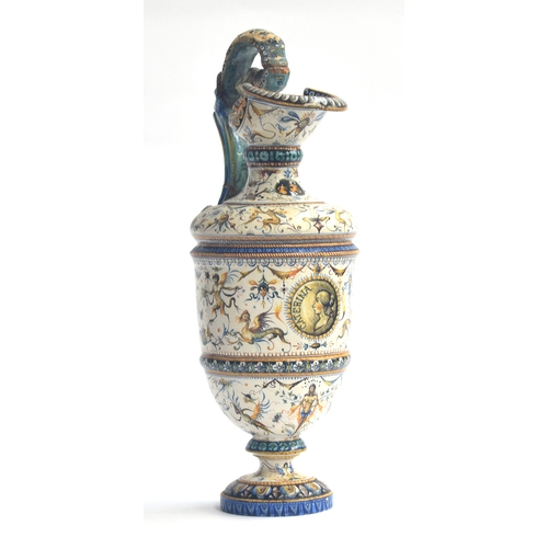 198 - A large 19th century Cantagalli majolica ewer, the handle restored, painted with mythological figure... 