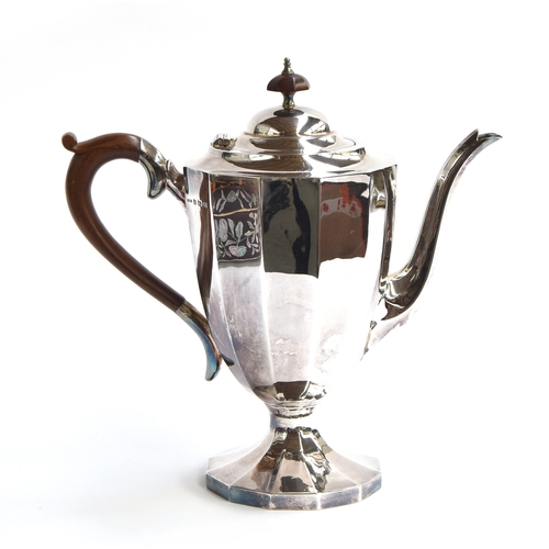 72 - A silver teapot by A Marston & Co, Birmingham 1938, of twelve sided form with scrolling wooden handl... 